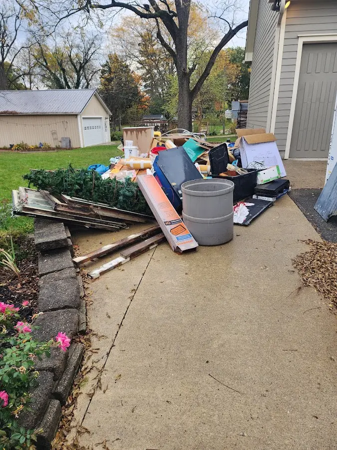 Dumpster being loaded with debris for Demolition Dumpster Rental in Sierra Vista